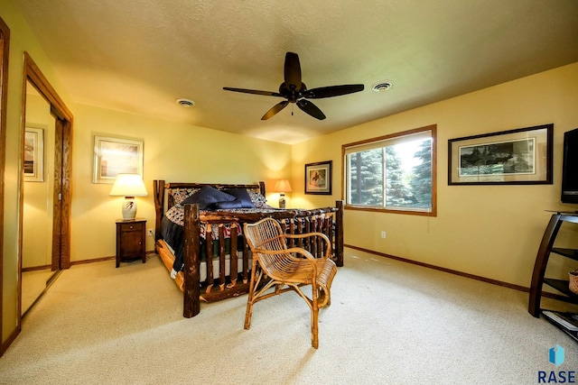 6811 E Split Rock Cir, Sioux Falls, SD 57110 - bedroom with light colored carpet and ceiling fan