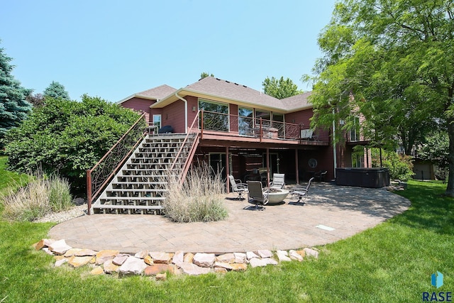 6811 E Split Rock Cir, Sioux Falls, SD 57110 - rear view of house featuring a patio area, a wooden deck, stairs, a lawn, and roof with shingles
