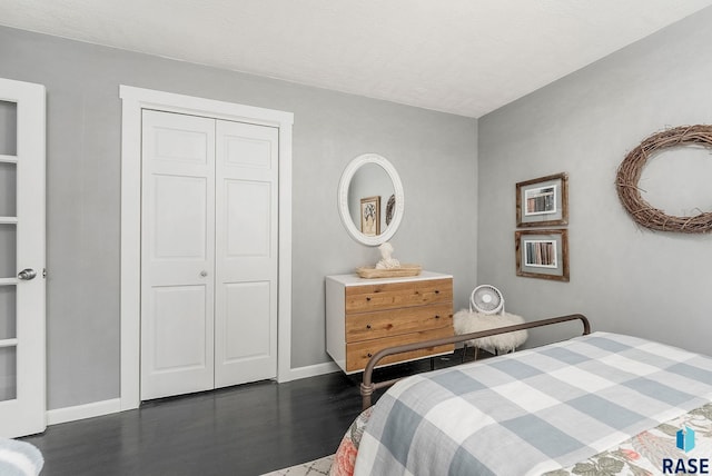 2109 W 37th St, Sioux Falls, SD 57105 - bedroom featuring dark wood finished floors and a closet