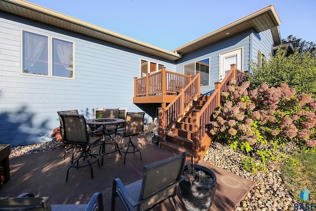 212 S Augusta Ave, Brandon, SD 57005 - view of patio / terrace with a deck, stairs, and outdoor dining space