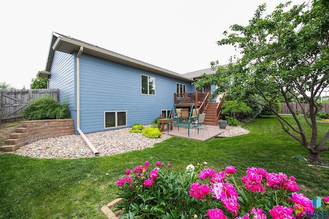 212 S Augusta Ave, Brandon, SD 57005 - rear view of house featuring stairway, a patio area, and a deck