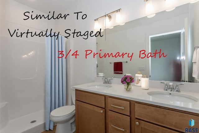 333 S Willow Spring Dr, Sioux Falls, SD 57110 - bathroom featuring double vanity and curtained shower
