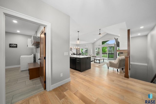 920 S Torrey Pine Ln, Sioux Falls, SD 57110 - hallway featuring light wood finished floors and lofted ceiling