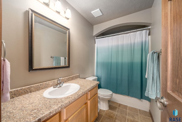 301 N Jenny Ave, Tea, SD 57064 - full bath with vanity, shower / bath combination with curtain, and a textured ceiling