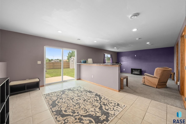 301 N Jenny Ave, Tea, SD 57064 - living area featuring light tile patterned floors, recessed lighting, and light carpet