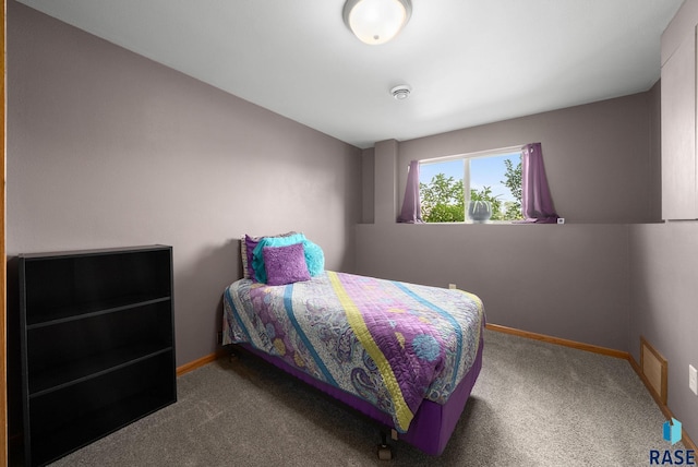 301 N Jenny Ave, Tea, SD 57064 - carpeted bedroom featuring baseboards