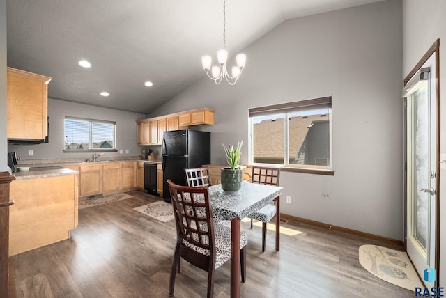 301 N Jenny Ave, Tea, SD 57064 - dining area with a chandelier, wood finished floors, recessed lighting, and high vaulted ceiling
