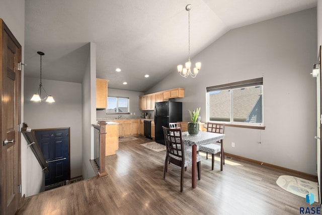 301 N Jenny Ave, Tea, SD 57064 - dining space featuring a chandelier, lofted ceiling, wood finished floors, and recessed lighting