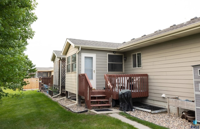 6707 S Witzke Ave, Sioux Falls, SD 57108 - back of house featuring a wooden deck