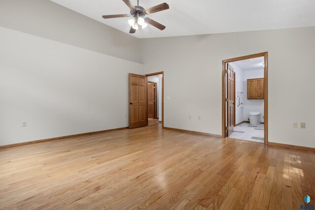 4220 S Minnesota Ave Unit 206, Sioux Falls, SD 57105 - spare room with ceiling fan, lofted ceiling, and light wood-type flooring