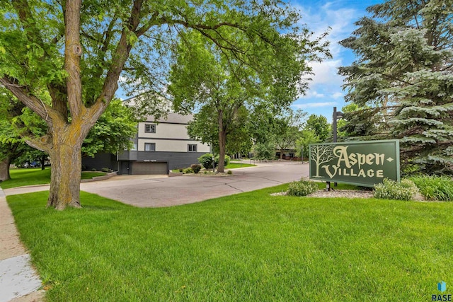4220 S Minnesota Ave Unit 206, Sioux Falls, SD 57105 - community / neighborhood sign with a lawn and an attached garage