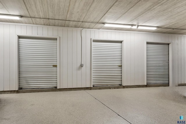 4220 S Minnesota Ave Unit 206, Sioux Falls, SD 57105 - garage featuring wood walls