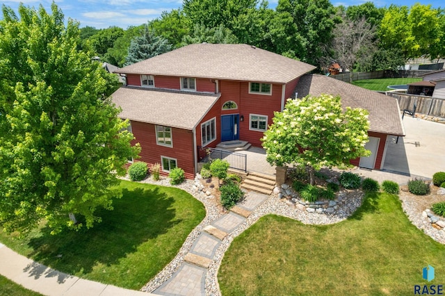 4513 S Southridge Dr, Sioux Falls, SD 57105 - view of front of property with roof with shingles and a front yard