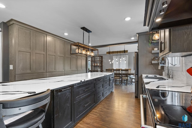 4513 S Southridge Dr, Sioux Falls, SD 57105 - kitchen featuring range hood, wood finished floors, recessed lighting, open shelves, and hanging light fixtures