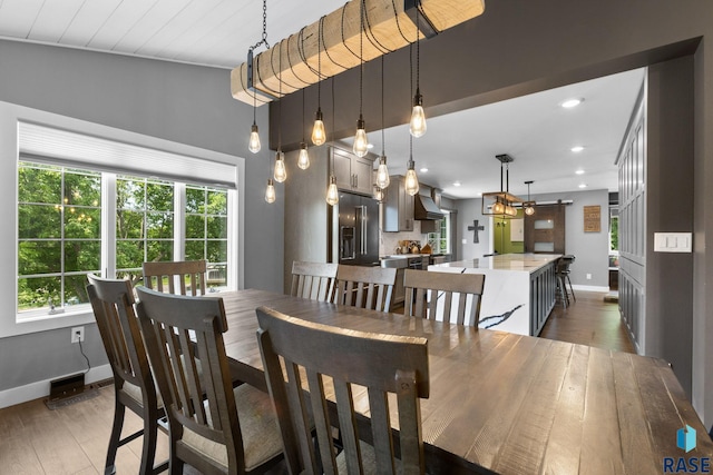 4513 S Southridge Dr, Sioux Falls, SD 57105 - dining space with plenty of natural light, hardwood / wood-style flooring, and recessed lighting