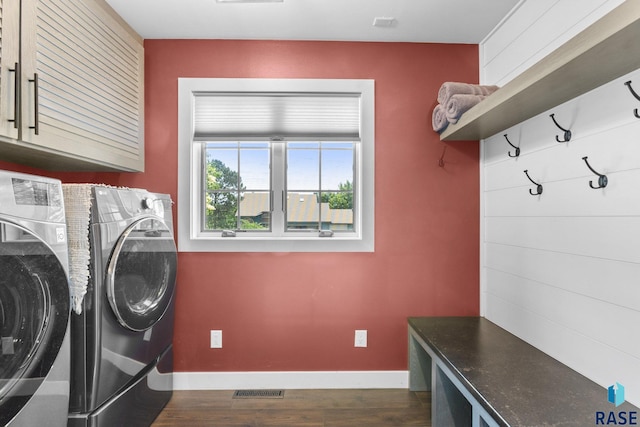 4513 S Southridge Dr, Sioux Falls, SD 57105 - washroom with cabinet space, separate washer and dryer, and dark wood-type flooring