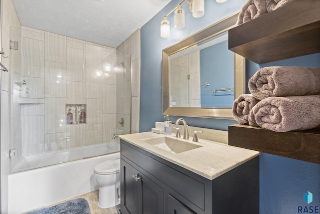 4513 S Southridge Dr, Sioux Falls, SD 57105 - bathroom with vanity, shower / tub combination, wood finished floors, and a textured ceiling