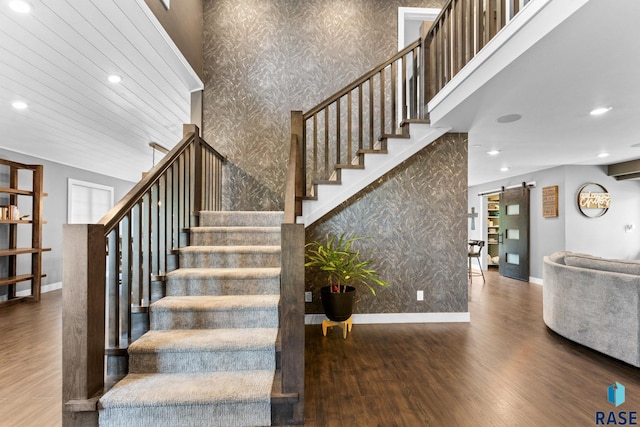 4513 S Southridge Dr, Sioux Falls, SD 57105 - stairs with wallpapered walls, wood finished floors, recessed lighting, and a barn door