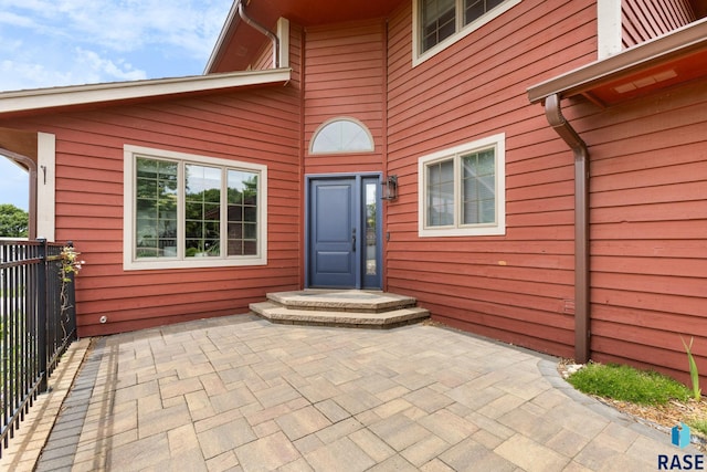 4513 S Southridge Dr, Sioux Falls, SD 57105 - view of exterior entry with a patio area