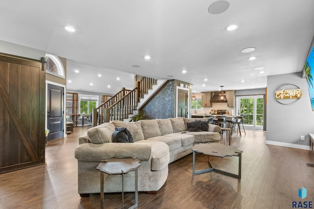 4513 S Southridge Dr, Sioux Falls, SD 57105 - living area with dark wood finished floors, plenty of natural light, recessed lighting, and stairway