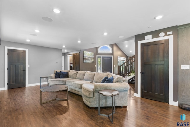 4513 S Southridge Dr, Sioux Falls, SD 57105 - living area featuring a barn door, stairway, dark wood-type flooring, recessed lighting, and vaulted ceiling