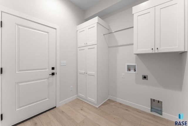 106 N Bryggen Pl, Sioux Falls, SD 57107 - washroom with cabinet space, light wood-type flooring, electric dryer hookup, and washer hookup