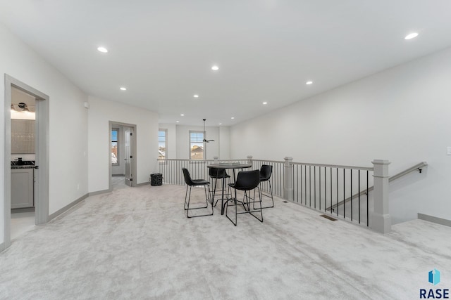 8611 W Shoreline Pl, Sioux Falls, SD 57107 - dining room with light carpet and recessed lighting