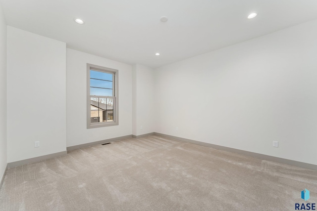 8611 W Shoreline Pl, Sioux Falls, SD 57107 - carpeted spare room featuring recessed lighting