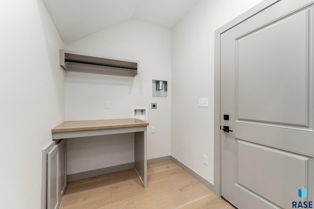 8611 W Shoreline Pl, Sioux Falls, SD 57107 - washroom featuring hookup for an electric dryer, light wood finished floors, and hookup for a washing machine