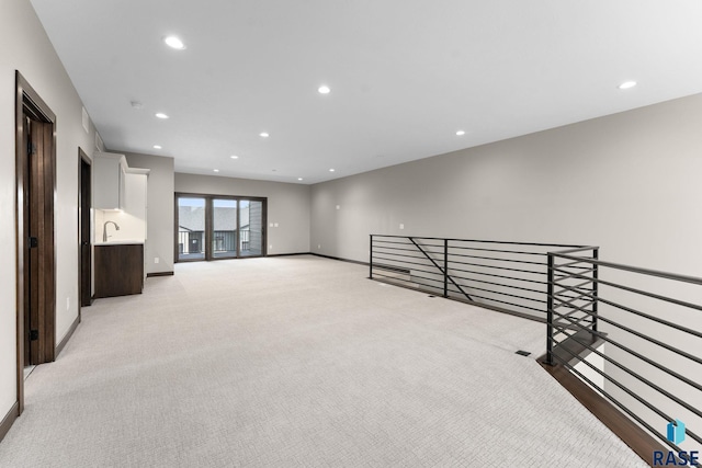 8619 W Shoreline Pl, Sioux Falls, SD 57107 - empty room featuring recessed lighting and light carpet