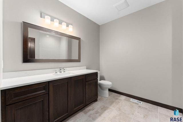 8619 W Shoreline Pl, Sioux Falls, SD 57107 - bathroom featuring vanity and toilet