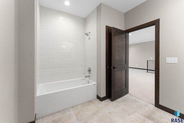 8619 W Shoreline Pl, Sioux Falls, SD 57107 - bathroom featuring shower / bathtub combination, tile patterned floors, and recessed lighting