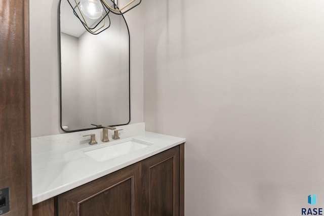 8619 W Shoreline Pl, Sioux Falls, SD 57107 - bathroom with vanity and a chandelier