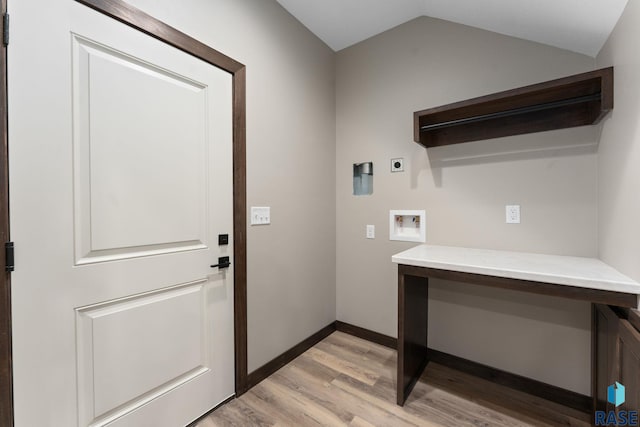 8619 W Shoreline Pl, Sioux Falls, SD 57107 - laundry room with hookup for an electric dryer, light wood finished floors, and hookup for a washing machine