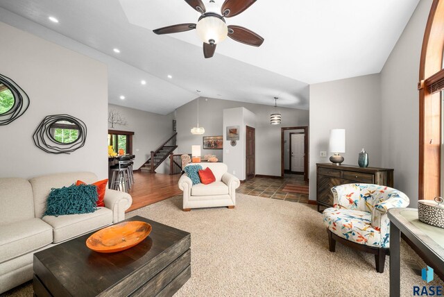 4400 E Aster Cir, Sioux Falls, SD 57103 - carpeted living room with vaulted ceiling, stairs, ceiling fan, and recessed lighting