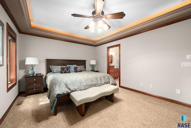 4400 E Aster Cir, Sioux Falls, SD 57103 - bedroom with ornamental molding, light carpet, a raised ceiling, a ceiling fan, and connected bathroom