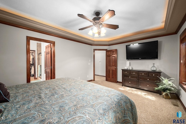 4400 E Aster Cir, Sioux Falls, SD 57103 - bedroom featuring light colored carpet, crown molding, a ceiling fan, and a tray ceiling