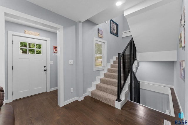 600 Sunnyside Ave, Valley Springs, SD 57068 - foyer entrance featuring dark wood finished floors and stairs