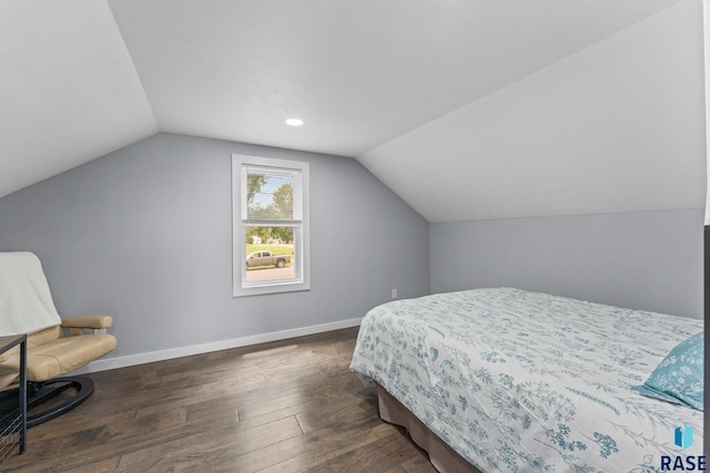 600 Sunnyside Ave, Valley Springs, SD 57068 - bedroom featuring vaulted ceiling and dark wood-style flooring