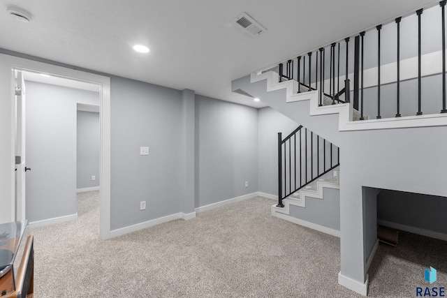 600 Sunnyside Ave, Valley Springs, SD 57068 - basement featuring carpet, stairs, and recessed lighting