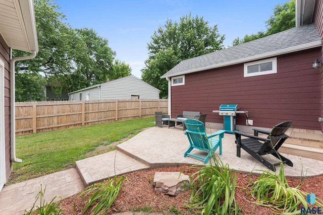 600 Sunnyside Ave, Valley Springs, SD 57068 - fenced backyard featuring a patio area and a grill