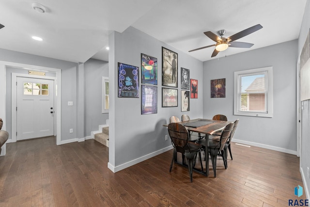 600 Sunnyside Ave, Valley Springs, SD 57068 - dining room featuring stairs, dark wood-type flooring, a ceiling fan, plenty of natural light, and recessed lighting