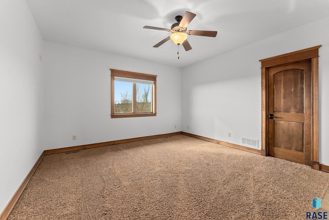 9005 E Torrey Pine Cir, Sioux Falls, SD 57110 - carpeted empty room with ceiling fan and baseboards