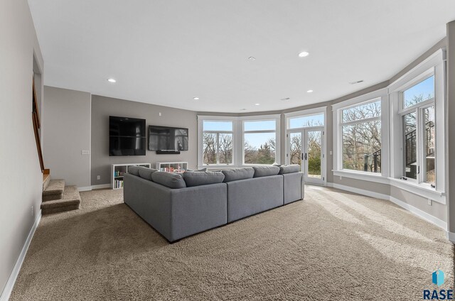 9005 E Torrey Pine Cir, Sioux Falls, SD 57110 - living area featuring carpet floors, healthy amount of natural light, and recessed lighting