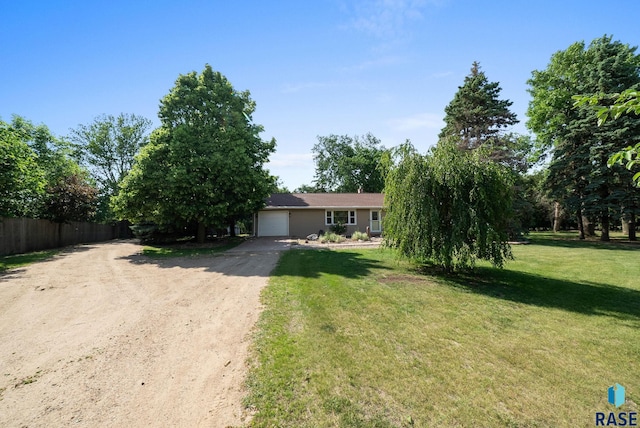 26045 485th Ave, Valley Springs, SD 57068 - view of front facade with dirt driveway and a garage
