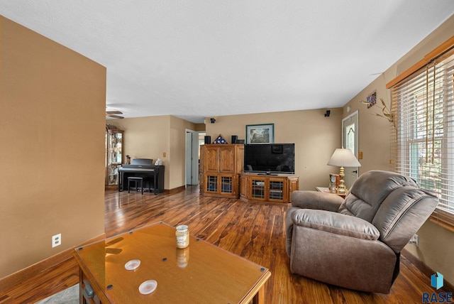 26045 485th Ave, Valley Springs, SD 57068 - living area with wood finished floors and ceiling fan