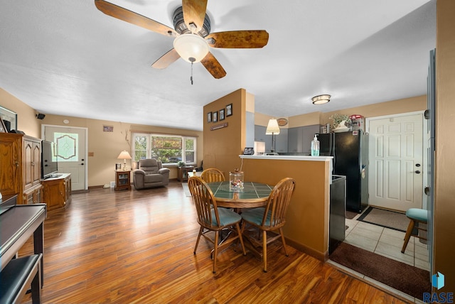 26045 485th Ave, Valley Springs, SD 57068 - dining room featuring wood finished floors and a ceiling fan