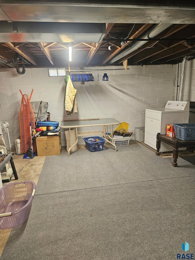 26045 485th Ave, Valley Springs, SD 57068 - unfinished below grade area featuring washing machine and clothes dryer and concrete block wall