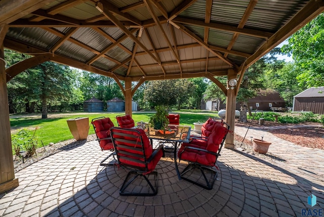 26045 485th Ave, Valley Springs, SD 57068 - view of patio with a storage shed, outdoor dining area, and a gazebo