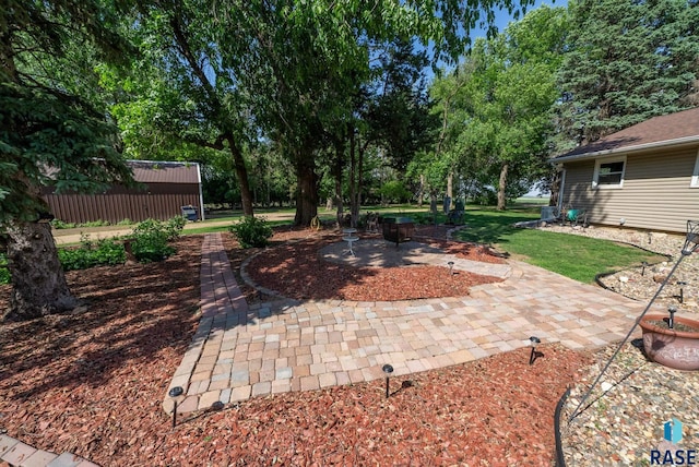 26045 485th Ave, Valley Springs, SD 57068 - view of patio / terrace featuring view of wooded area